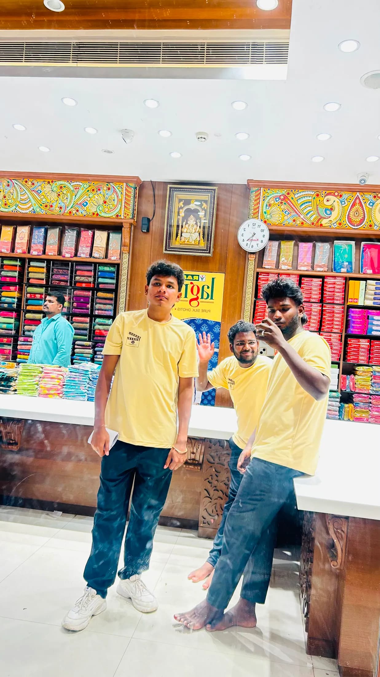 A traditional retail counter stacked with colourful stock